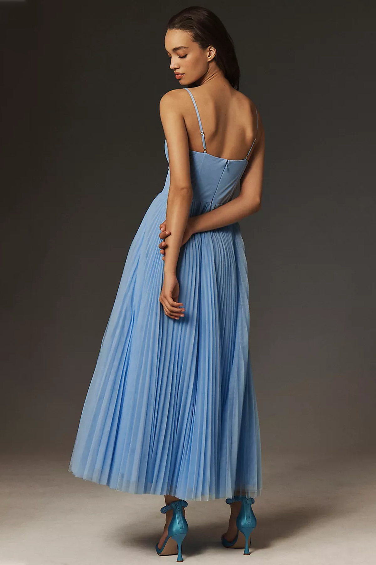 Light-blue chiffon midi dress, back view with spaghetti straps and pleated skirt