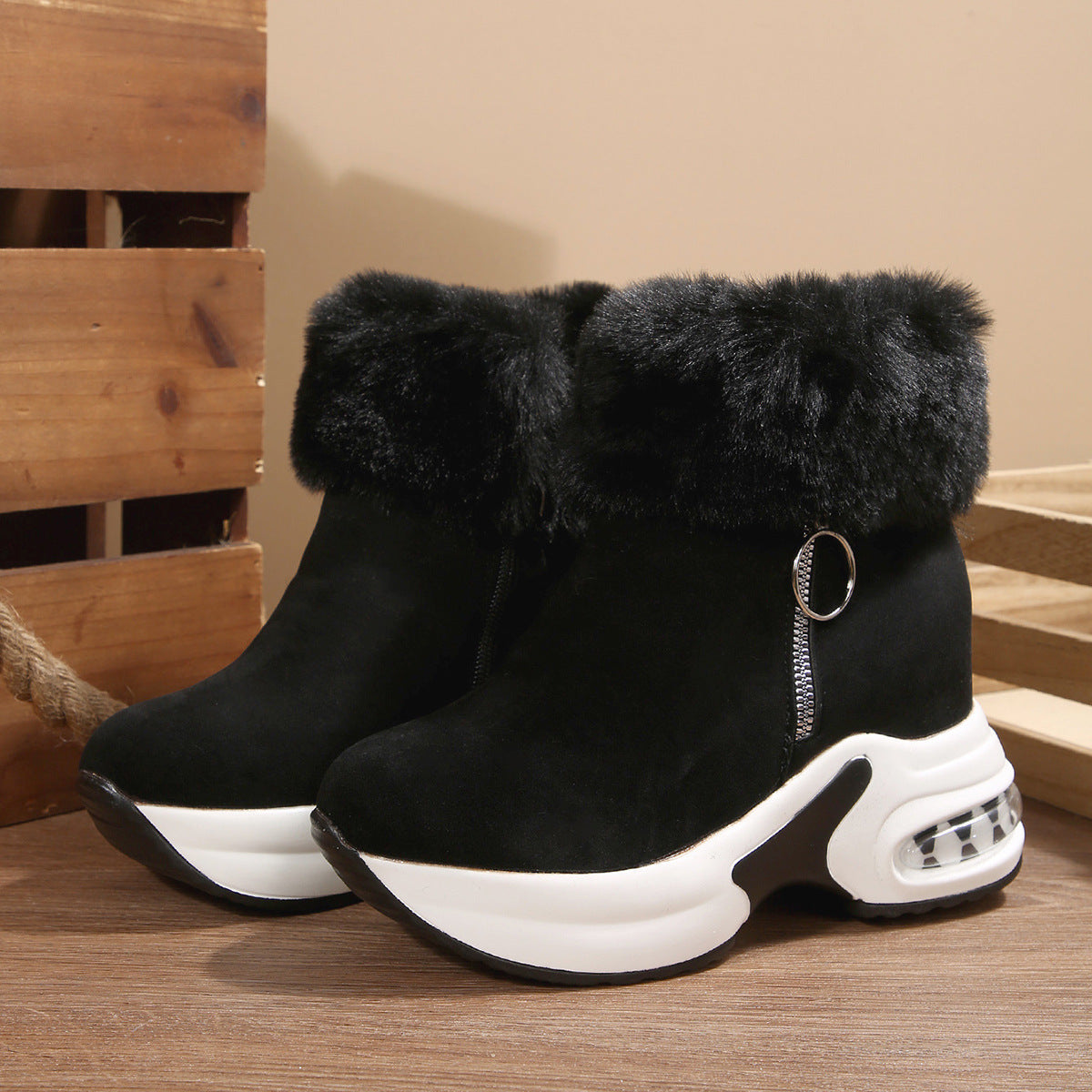 Black suede fleece-lined snow boots with side zipper, faux-fur cuffs, chunky white platform sole