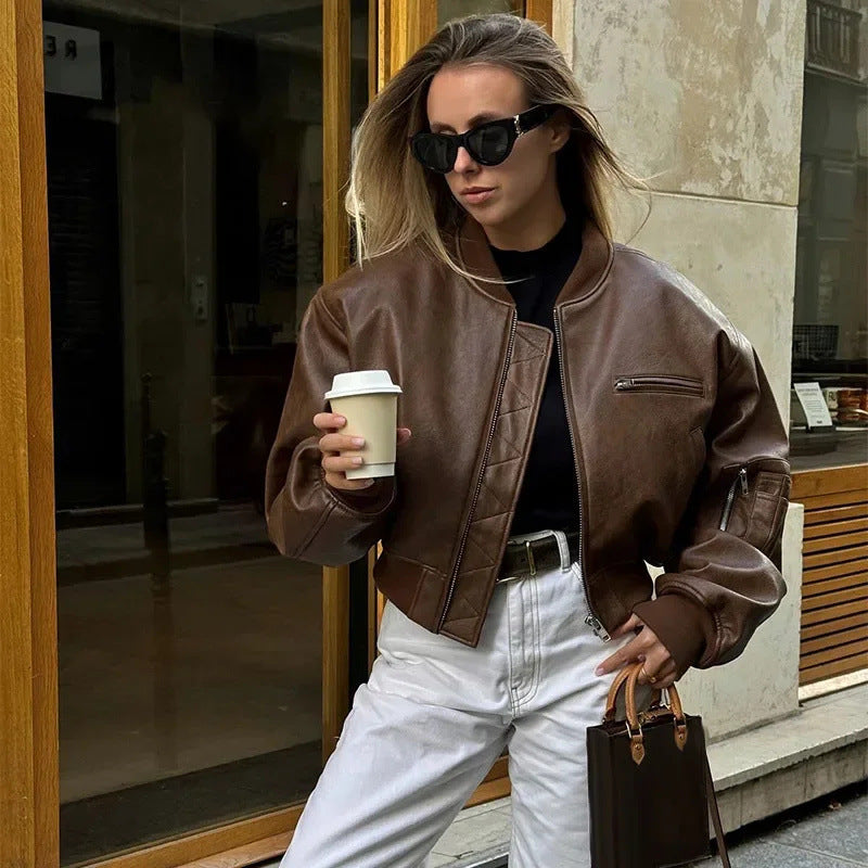 Women’s brown zip-front jacket with chest pocket and stand collar