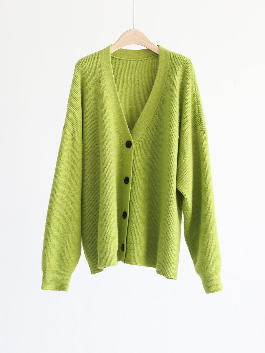 Green V-neck mohair cardigan on hanger, long sleeves and button front