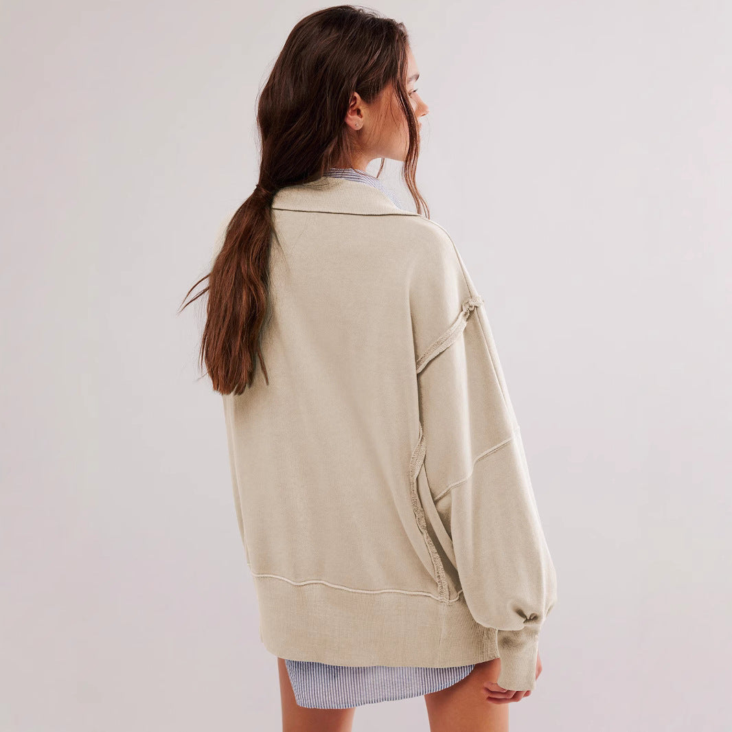 Women's cream polo-collar sweatshirt top with lantern sleeves, relaxed back view