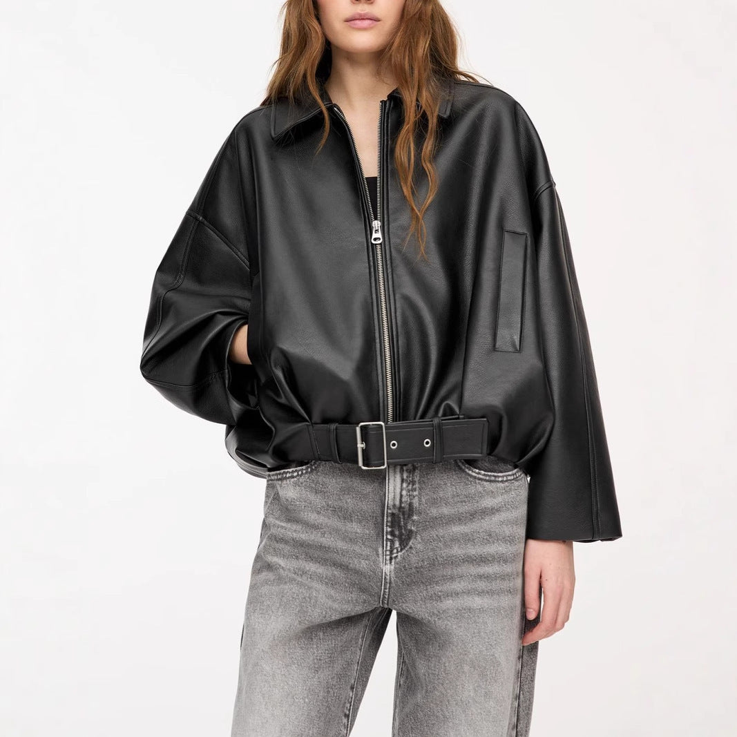 Black faux leather pilot jacket with front zipper, stand collar, and wide belt