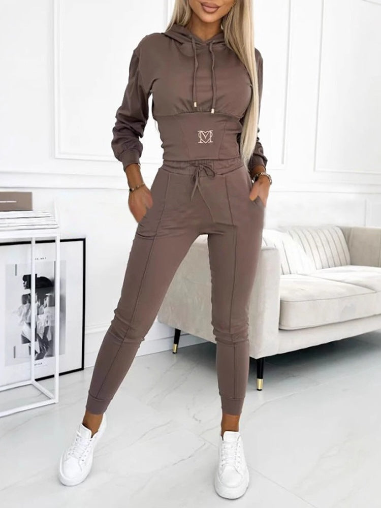 Brown hooded top and long jogger pants set, drawstring waist and front logo.
