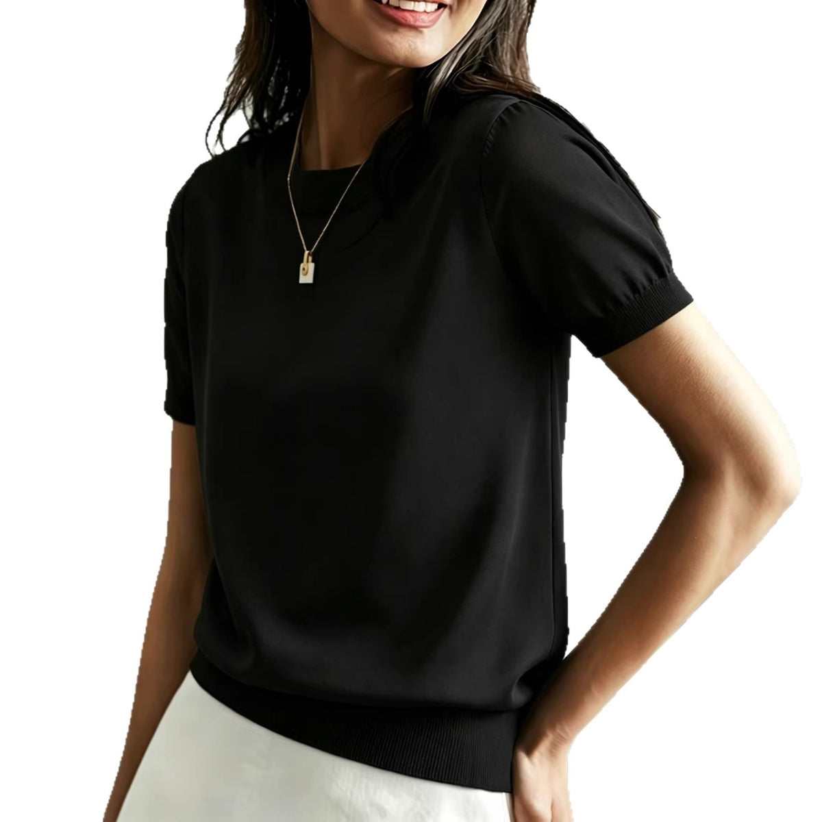 Women's black round-neck t-shirt with short sleeves and ribbed hem detail