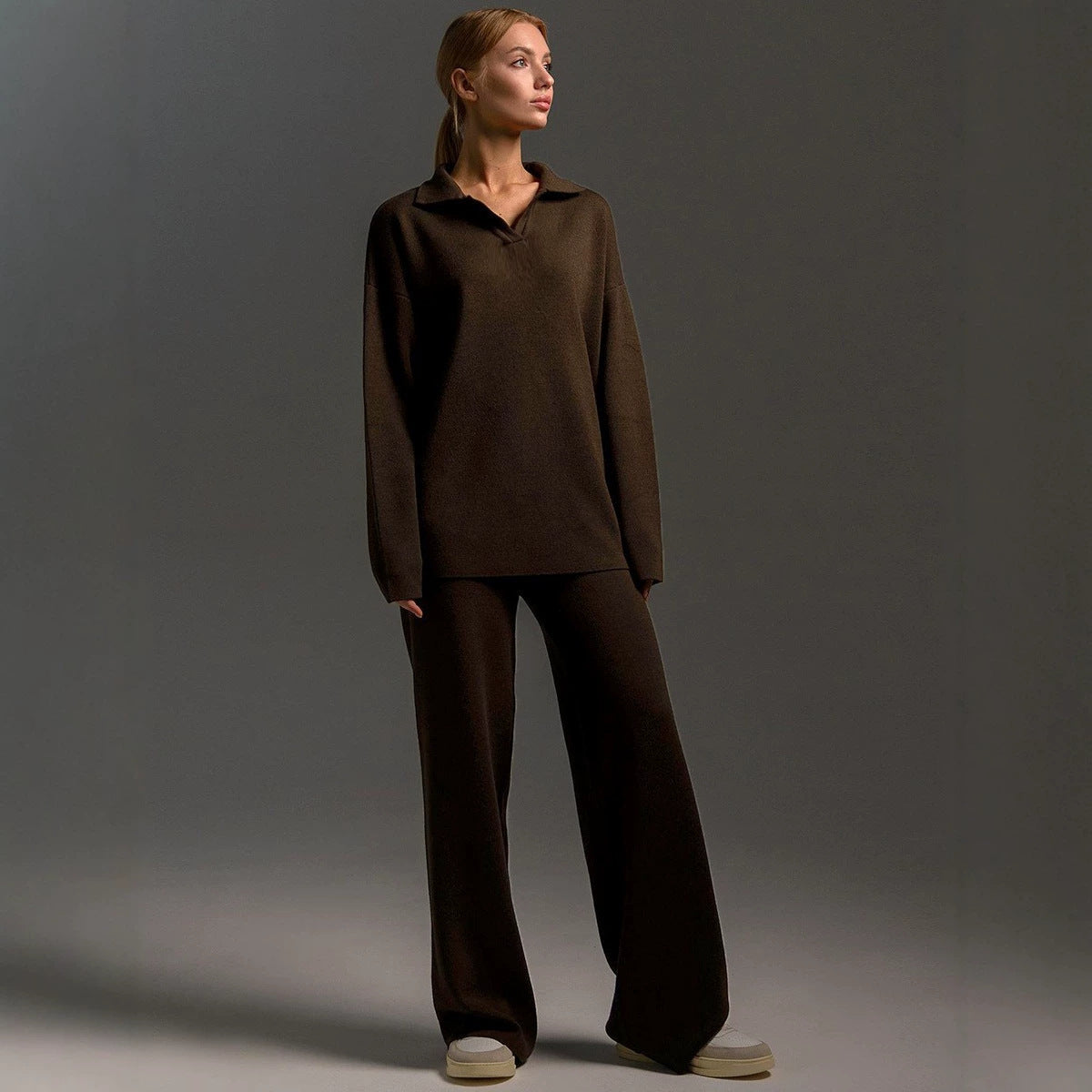 Dark brown women's polo-neck two-piece set with wide-leg pants, front pose