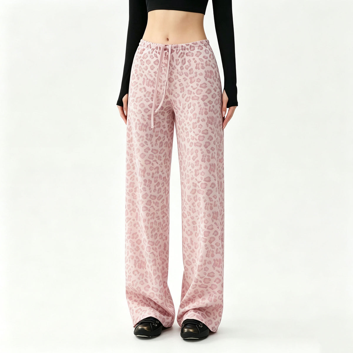 Women’s wide-leg leopard-print leggings in light pink with darker spots; drawstring waist.