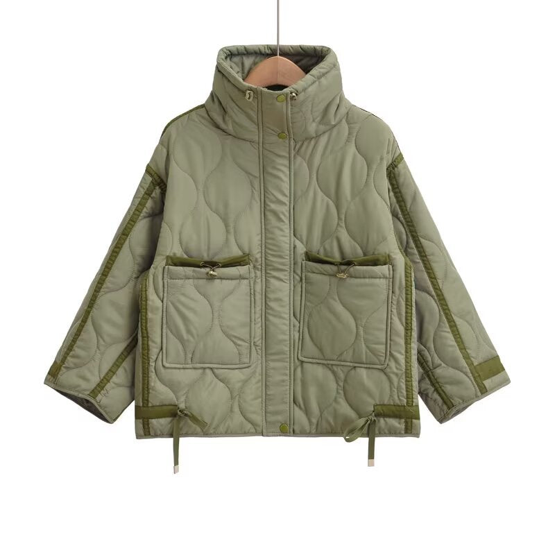 Olive quilted stand-collar jacket with zip front, chest pockets, and hanging ties