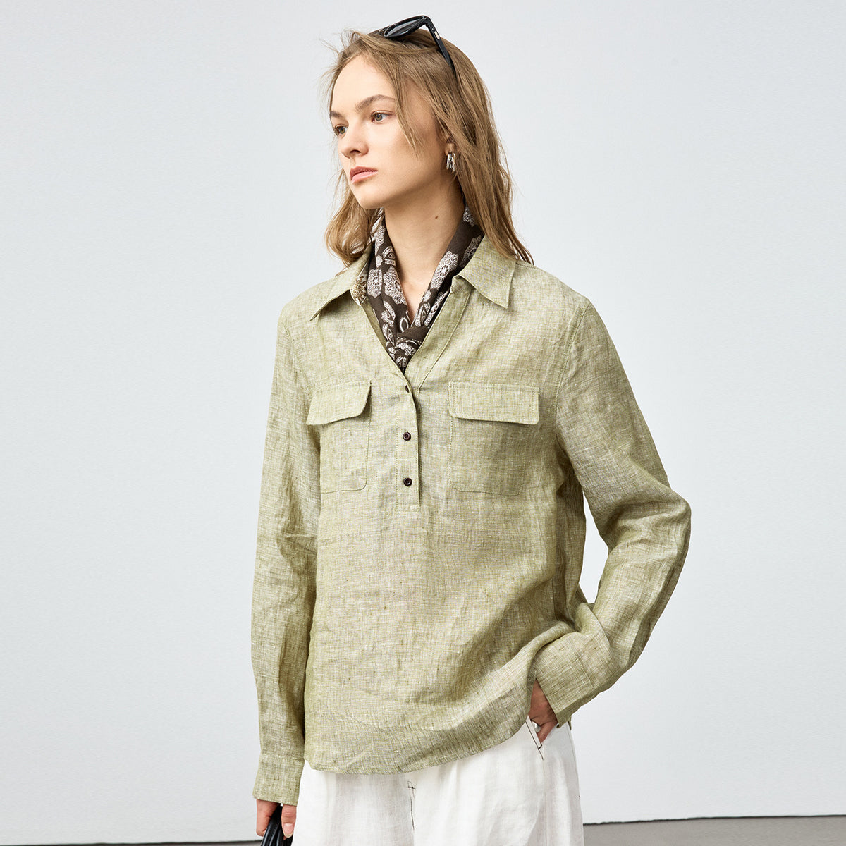 Women’s olive linen button-up shirt with two chest pockets and neck scarf