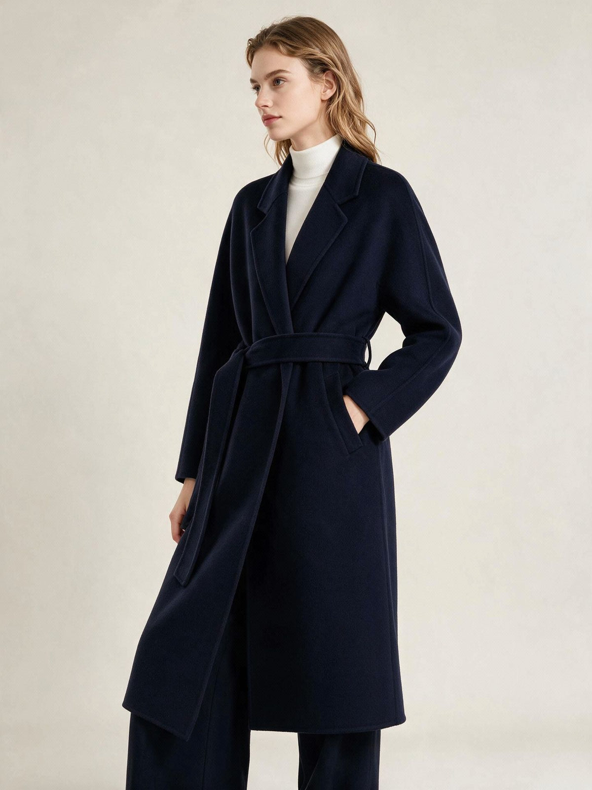 Navy double-breasted wool cashmere coat with tie-waist belt and notch lapels