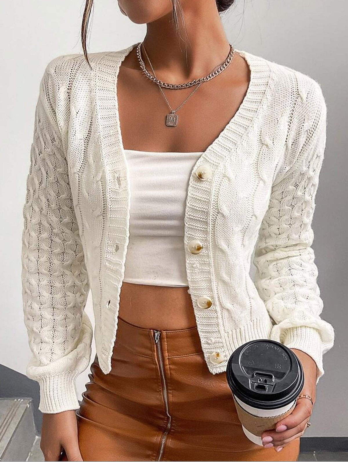 Milky white cable-knit cardigan sweater, v-neck with buttons, ribbed trim, long sleeves