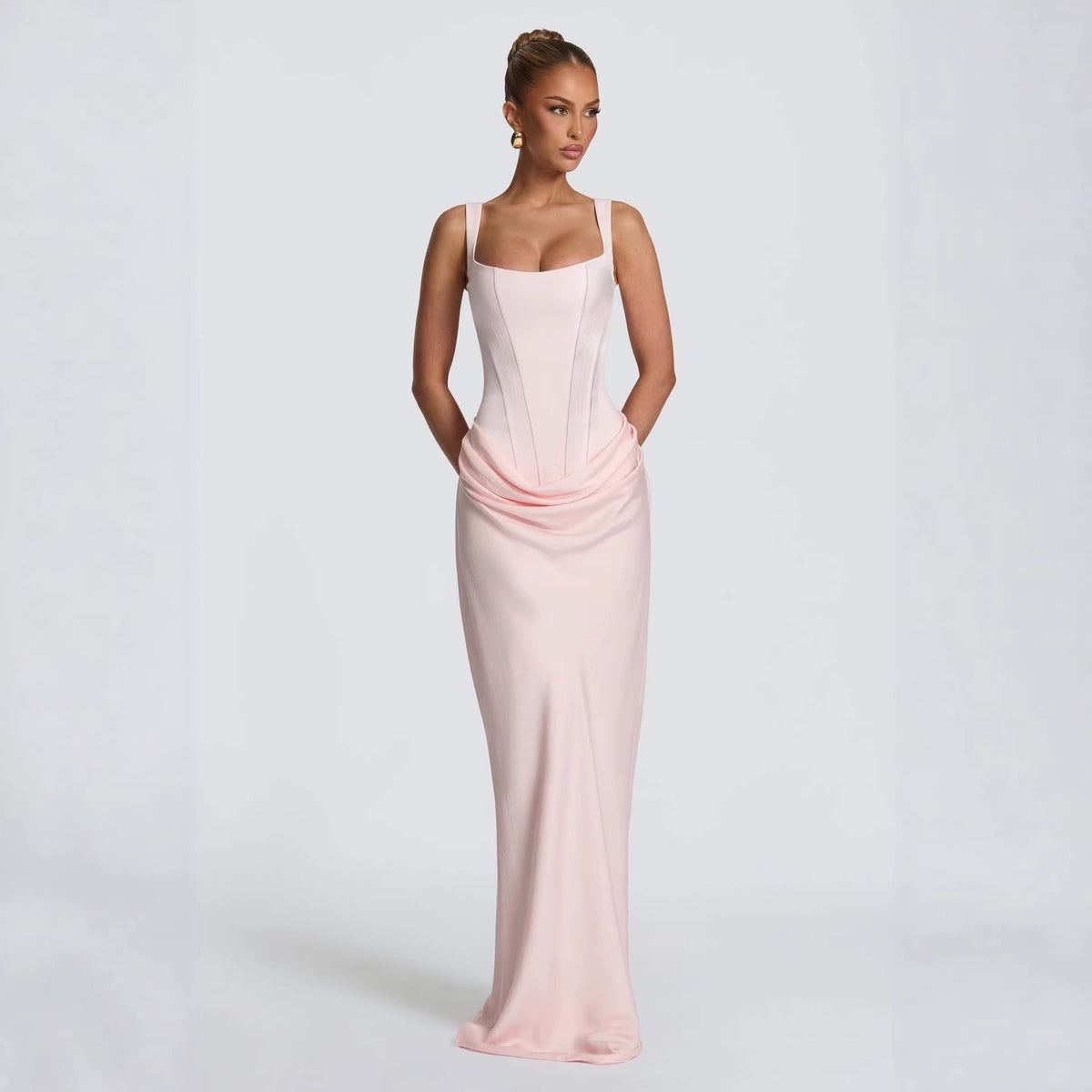 Blush pink spaghetti-strap ruched bodycon maxi dress with draped waist
