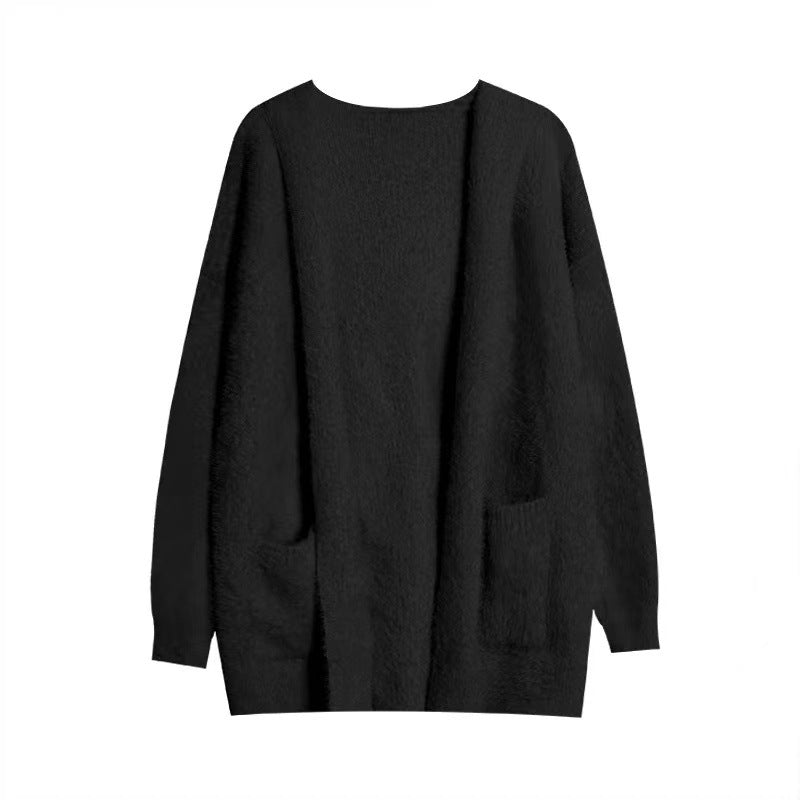 Oversized black wool cardigan with shawl collar, open front, side pockets, chunky knit