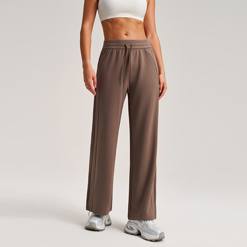 Dark brown high-waisted wide-leg sweatpants with drawstring and relaxed straight legs, front view