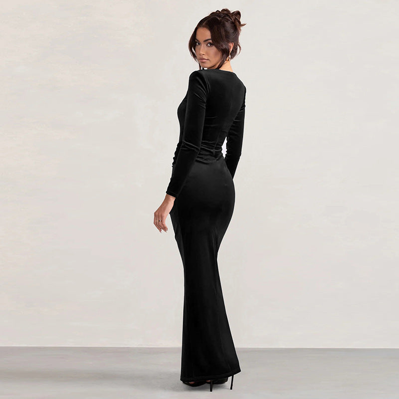 Black velvet long-sleeve fitted dress with column silhouette and front slit
