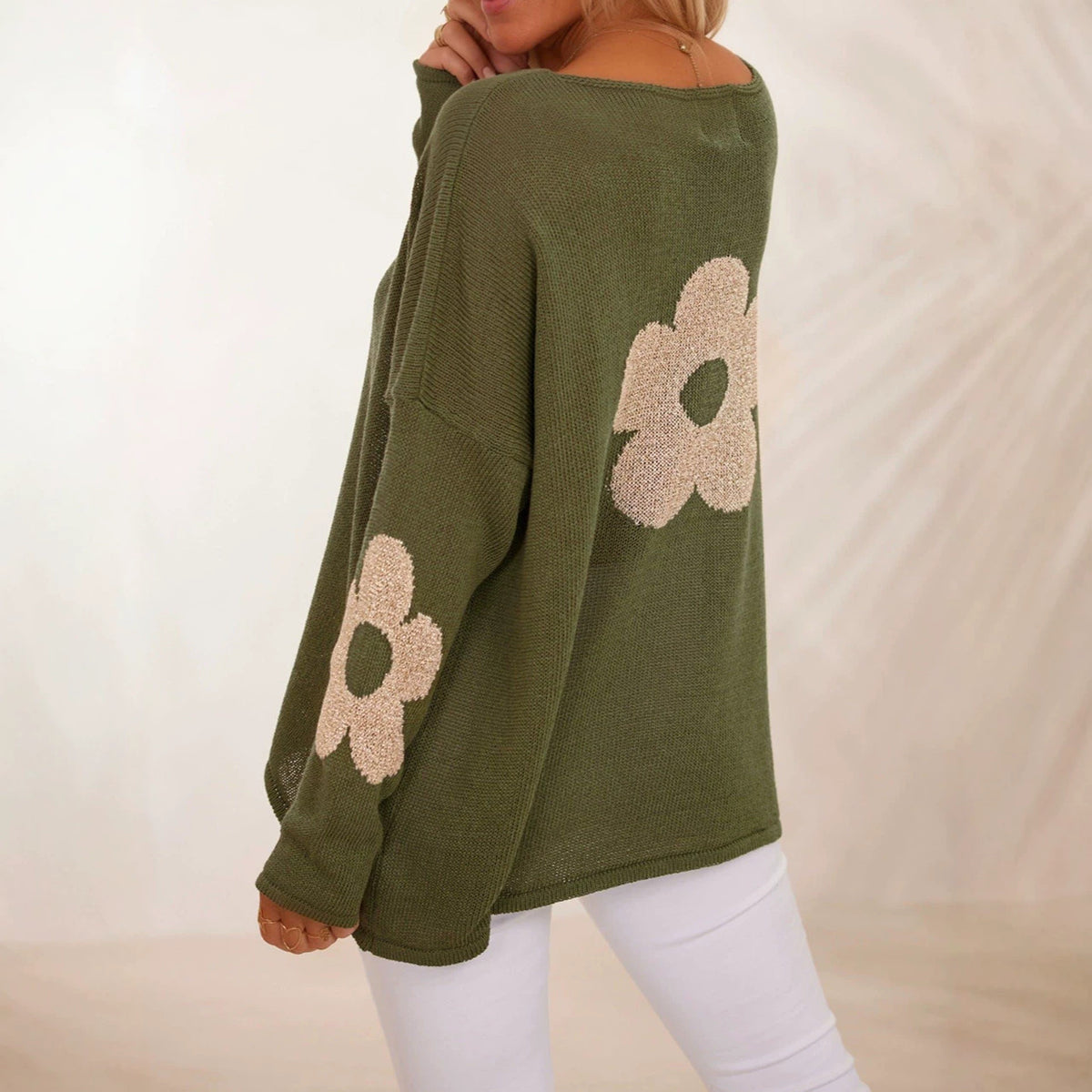 Olive-green floral jacquard sweater, loose pullover with long sleeves and round neck.