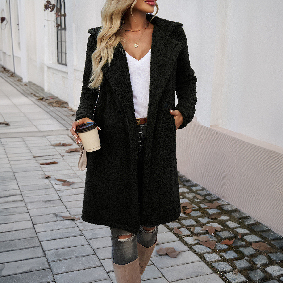 Women's hooded loose knit coat, black textured fleece, long sleeves, front pockets