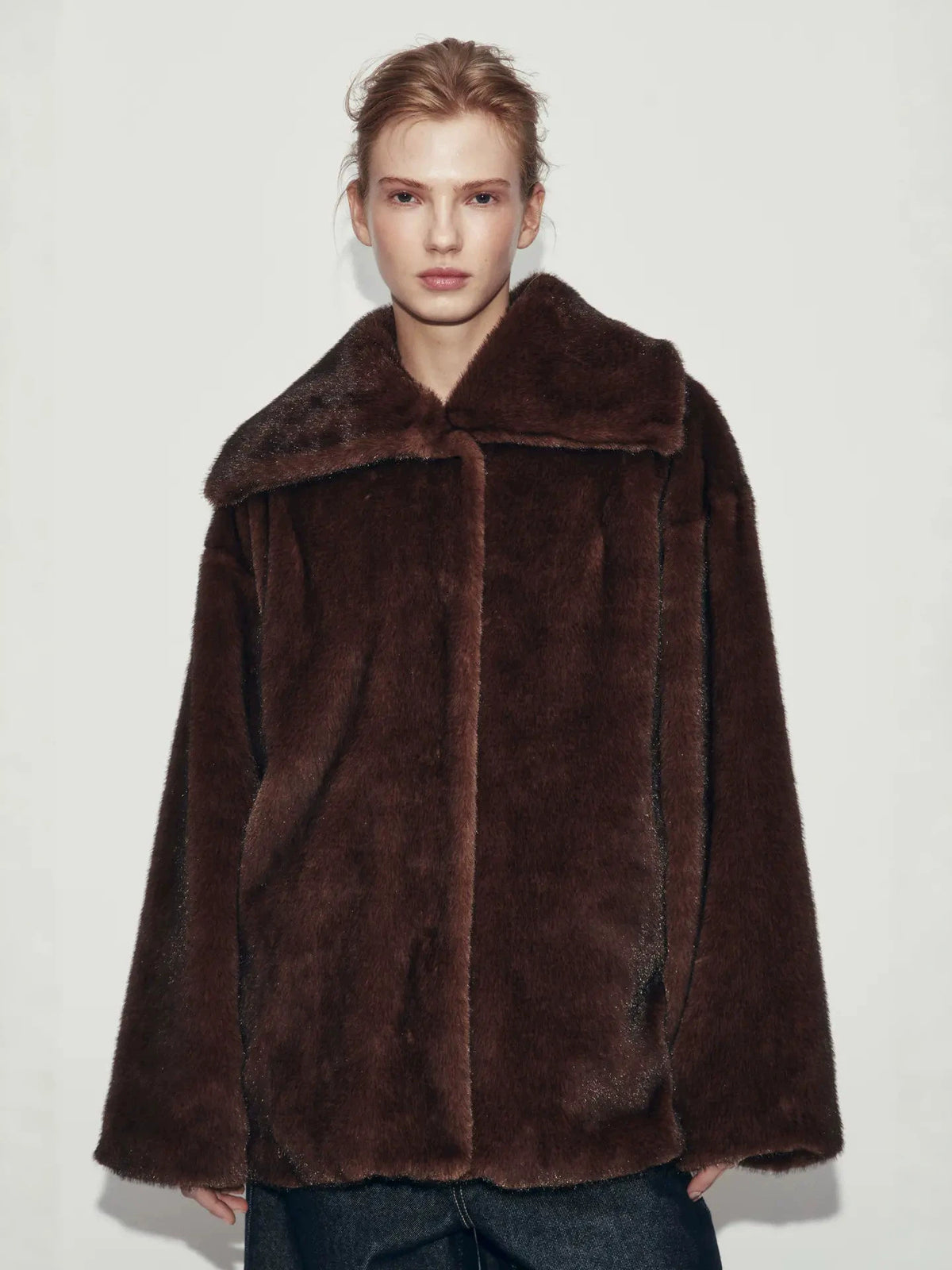 Wine-brown faux fur coat with oversized collar and front button closure