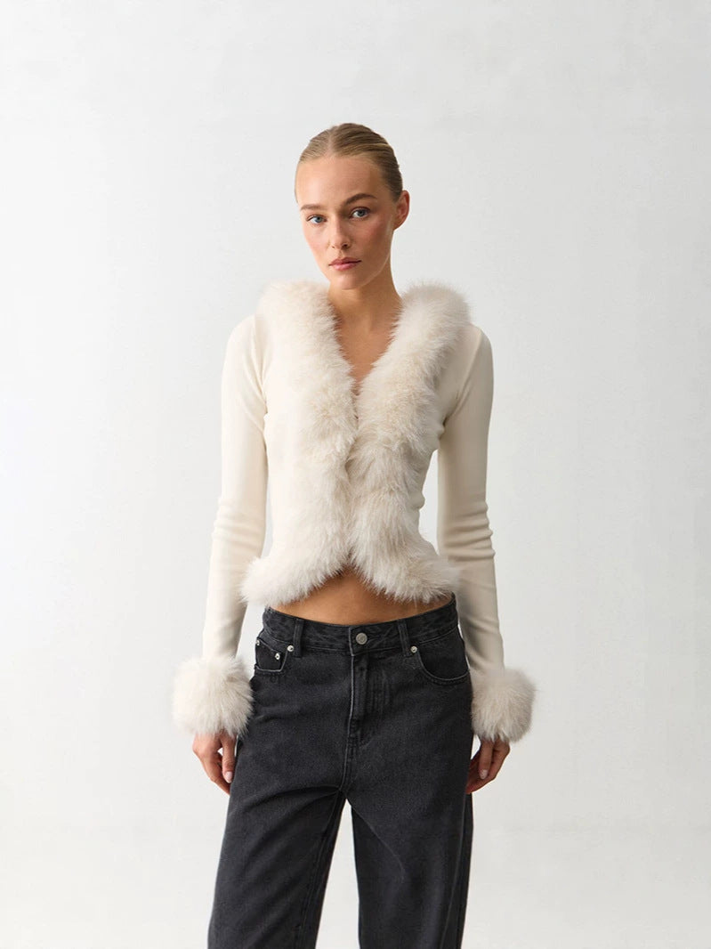 White faux fur cardigan with V-neck styling, long sleeves, open front, fluffy trim