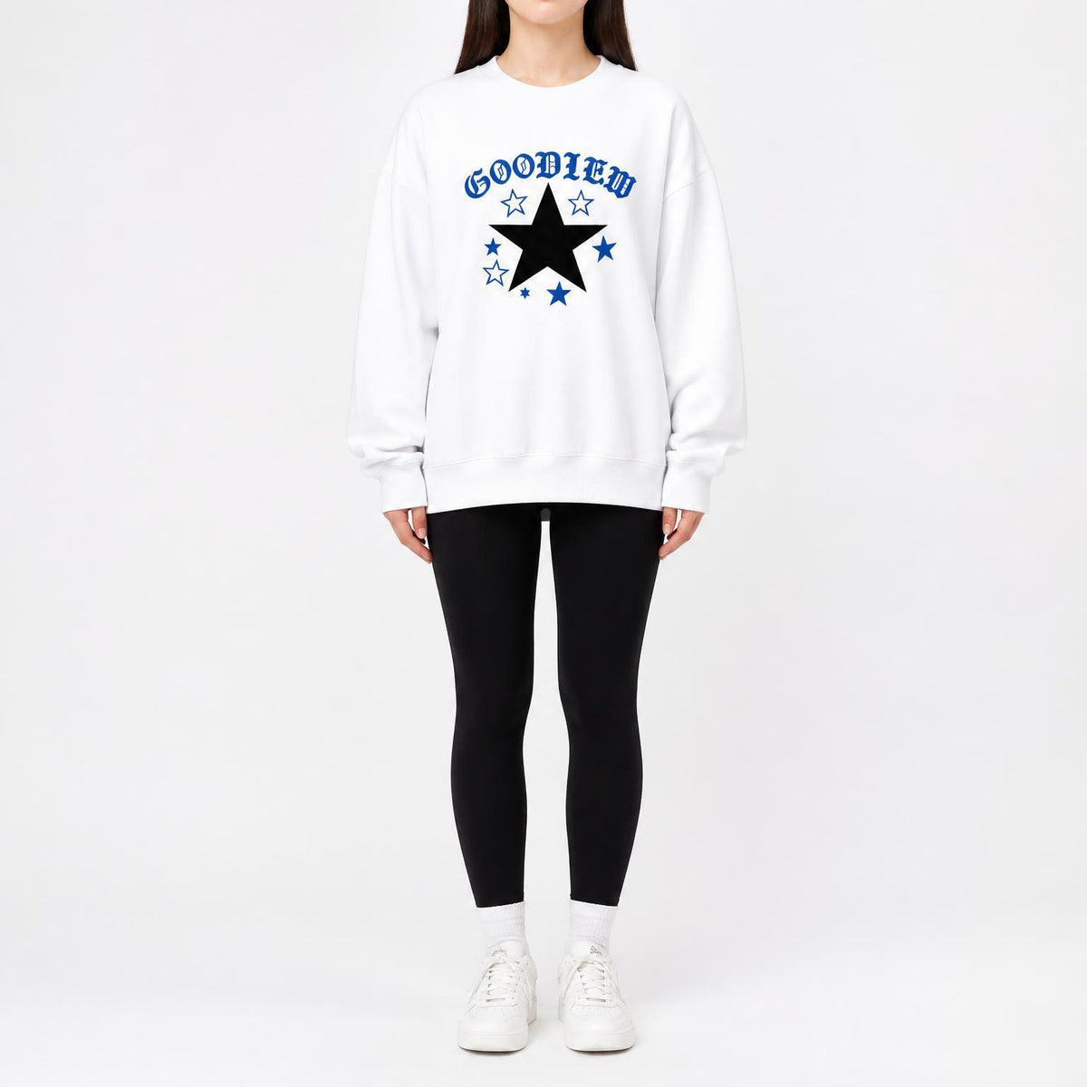 White crewneck sweatshirt with blue star-and-text graphic, loose relaxed silhouette