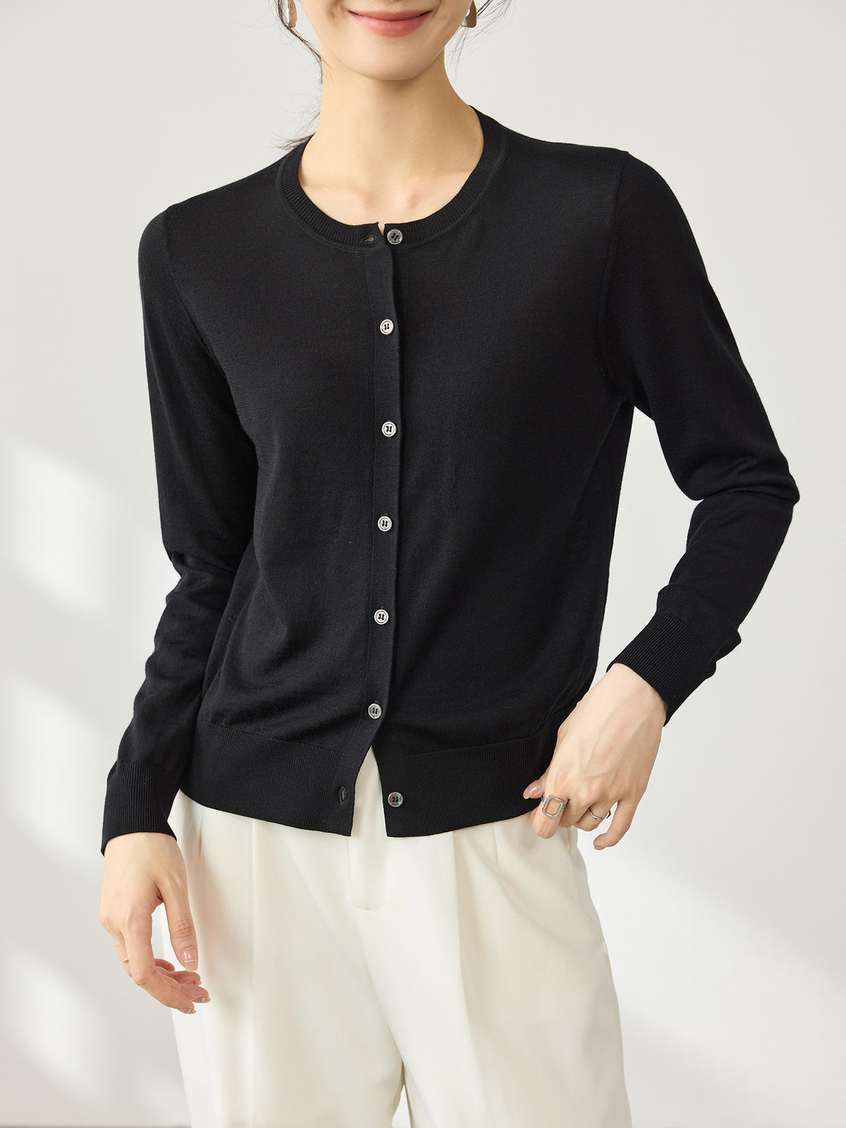 Women's black wool cardigan, round neck button-front, long sleeves