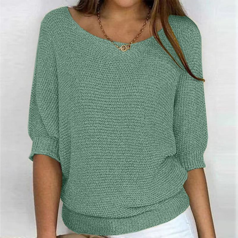 Off-shoulder knit sweater in green, batwing sleeves with gathered cuff detail