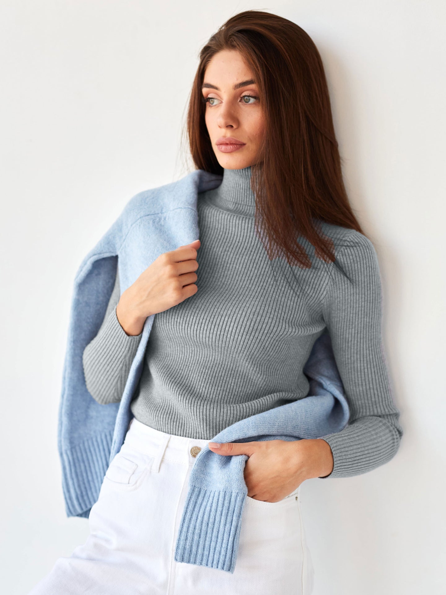 Light blue ribbed turtleneck knit sweater with long sleeves