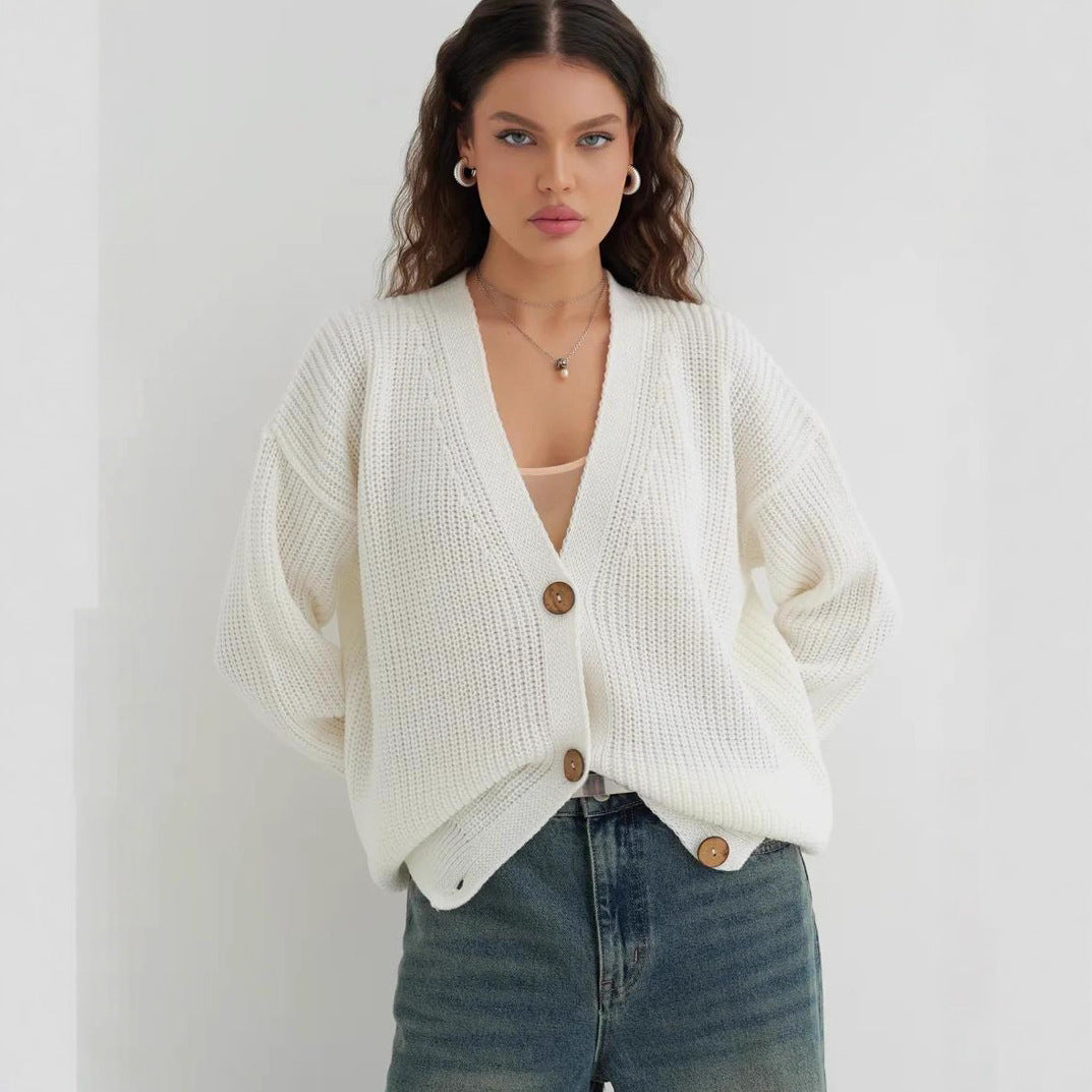 Women’s milky-white knitted cardigan sweater, button-front V-neck, textured knit with pockets