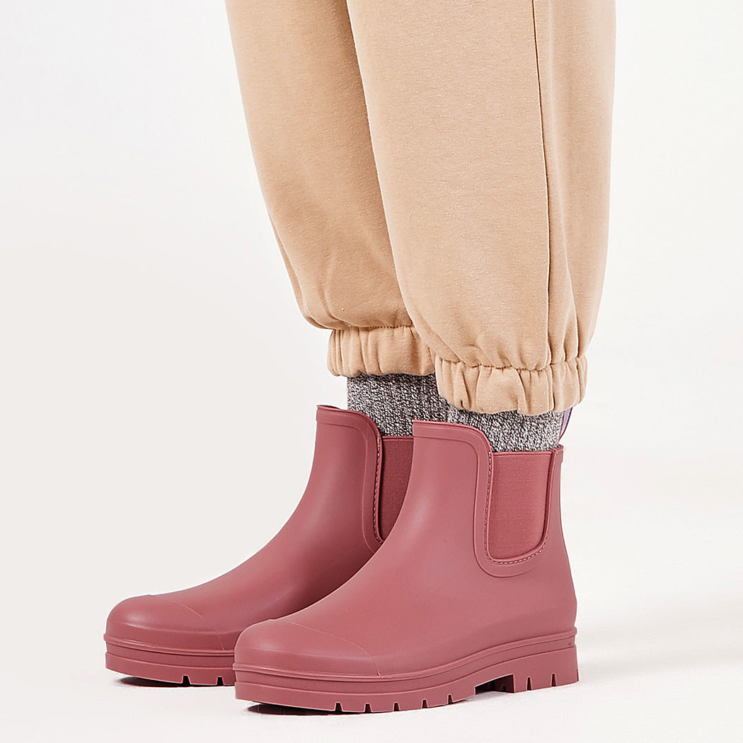 Hawthorn red short rain boots with pull-on side panels and traction tread outsole