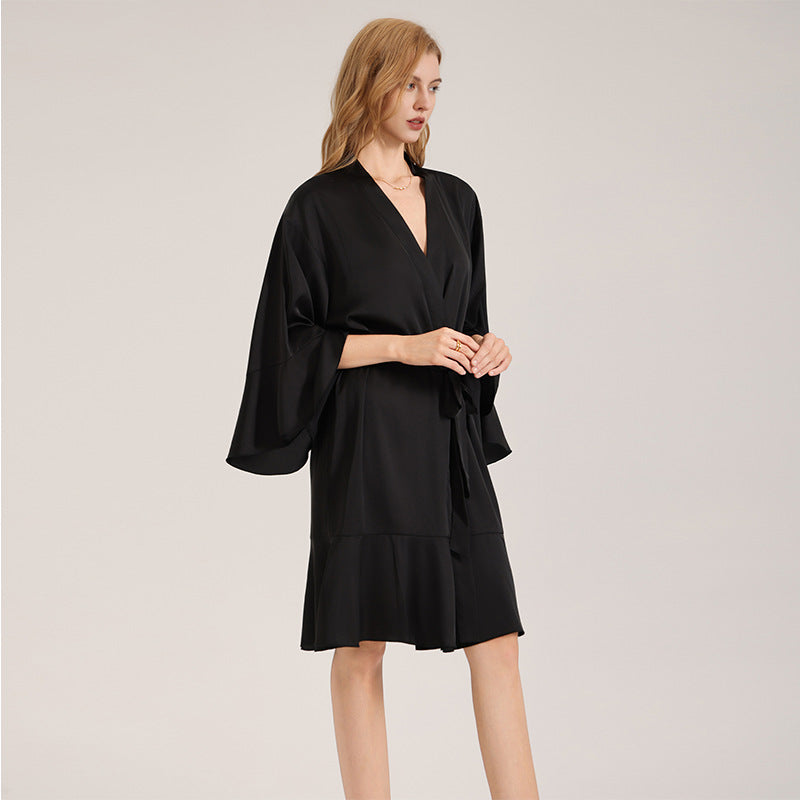 Black satin kimono-style bathrobe with V-neck and tie waist, mid-length hem