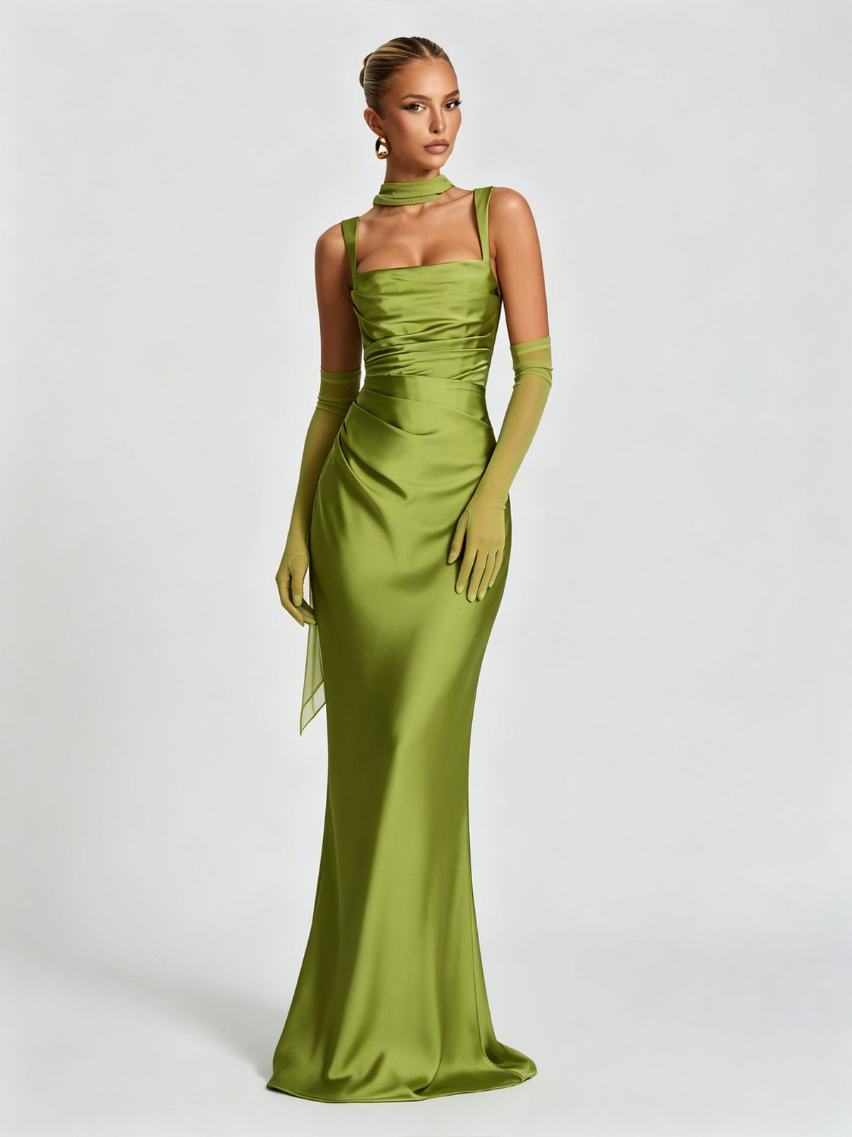 Green satin square-neck spaghetti strap gown with chest ruching and scarf panel