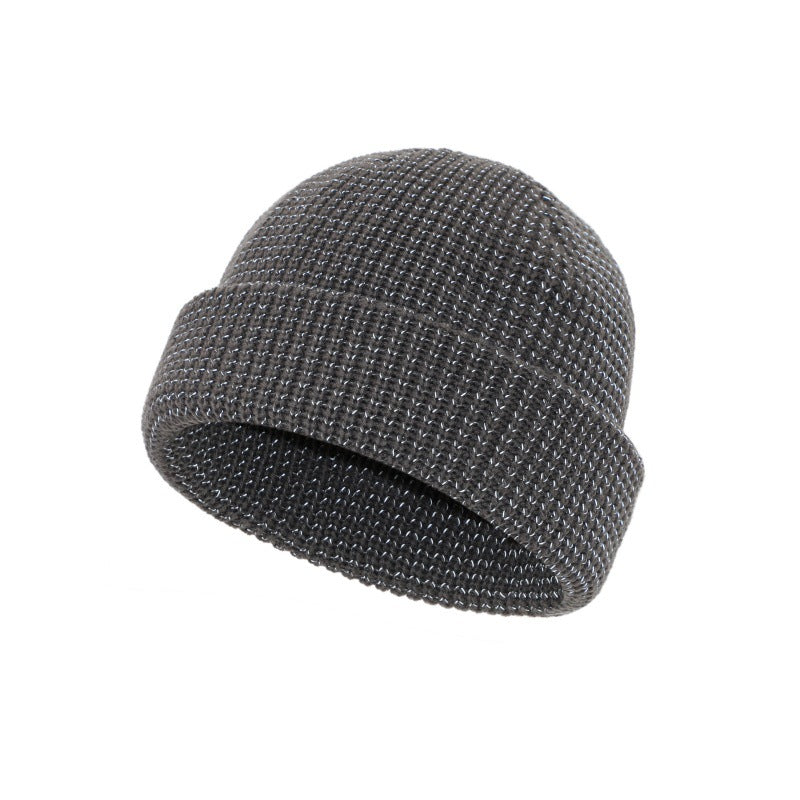 Grey knitted beanie hat with folded cuff, textured stitch knit