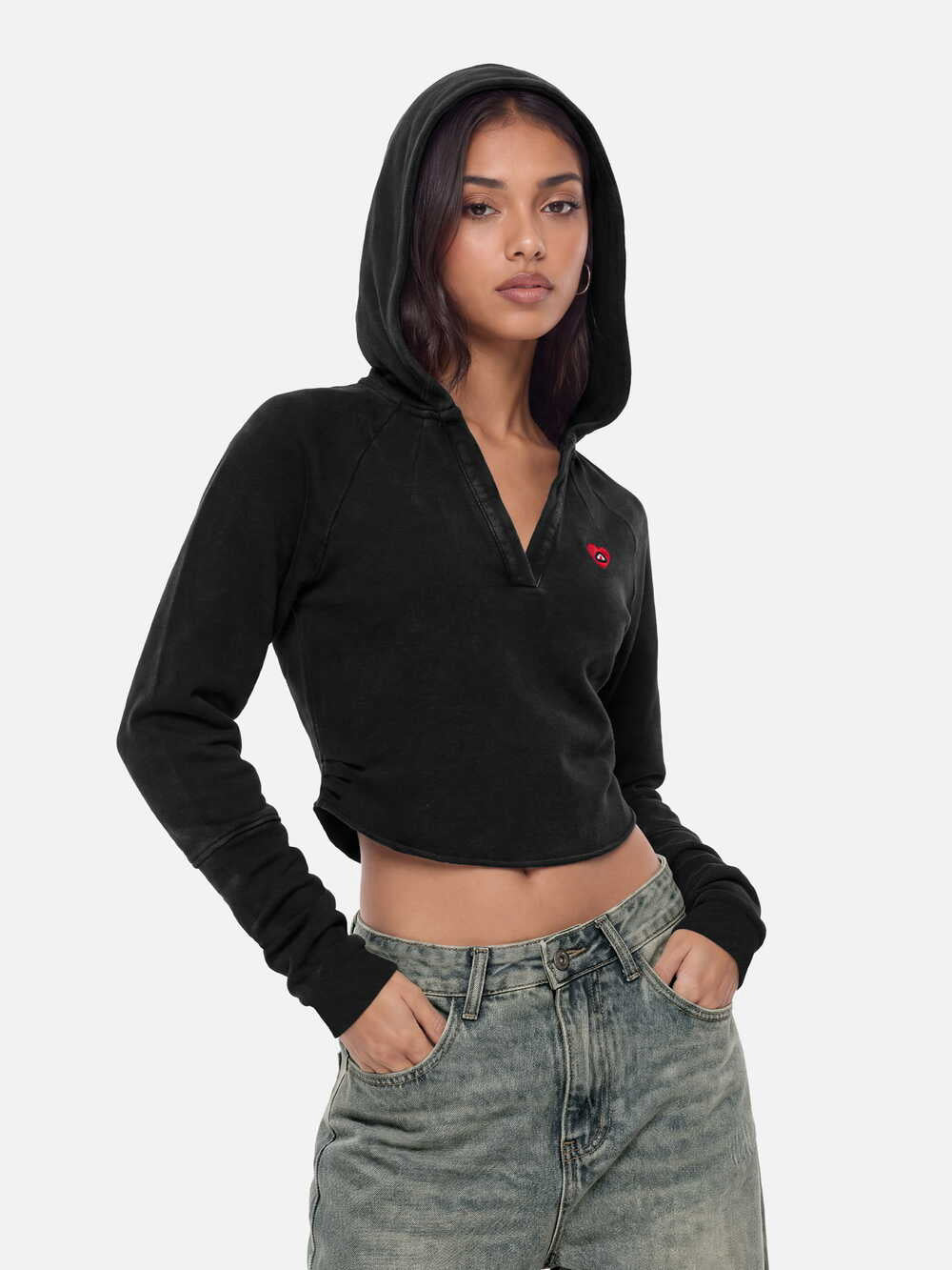 Black cropped hooded sweatshirt with long sleeves and small chest logo
