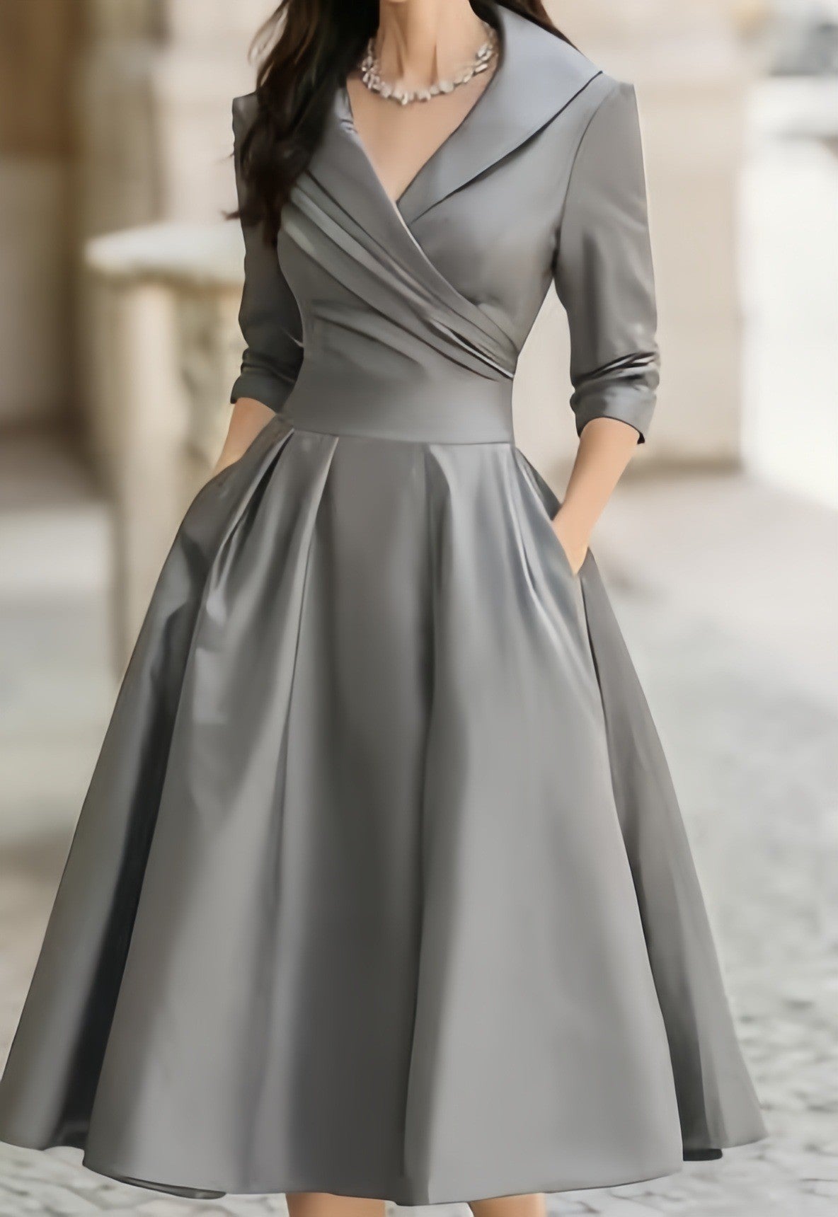Women’s waist-cinching dress, gray, long sleeves, V-neck, pleated A-line skirt.