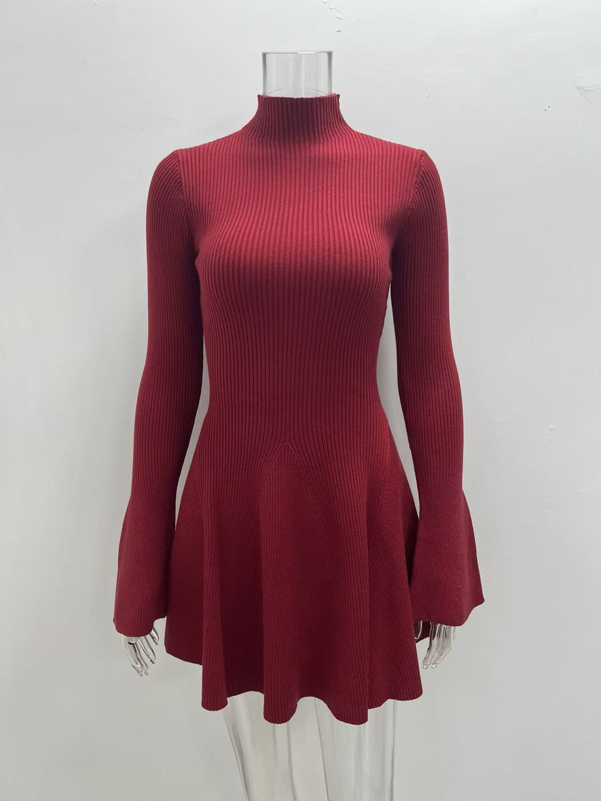 Wine red ribbed knit sweater dress with high neck, long sleeves, and A-line flare hem