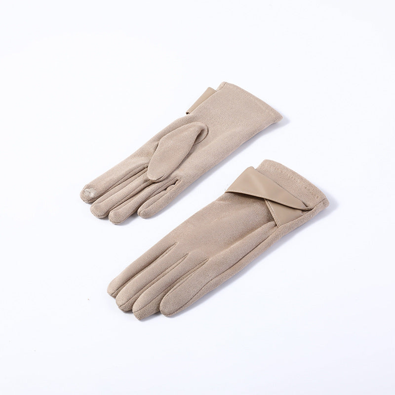 Pair of women’s beige velvet gloves with long cuffs and minimal seams