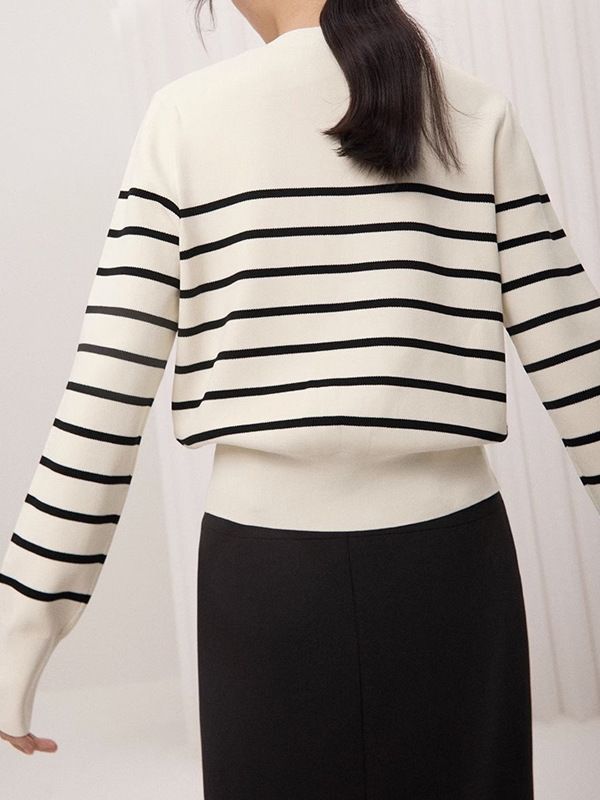 Women’s cream knit sweater with black horizontal stripes, long sleeves