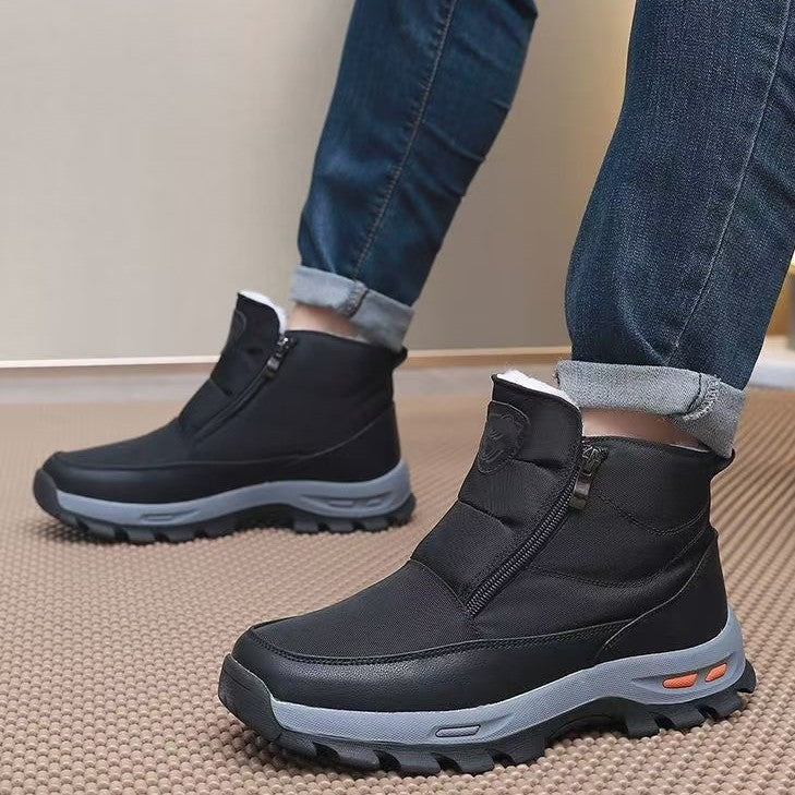 Black winter shoe boots with side zipper, rugged sole, and orange accent detail