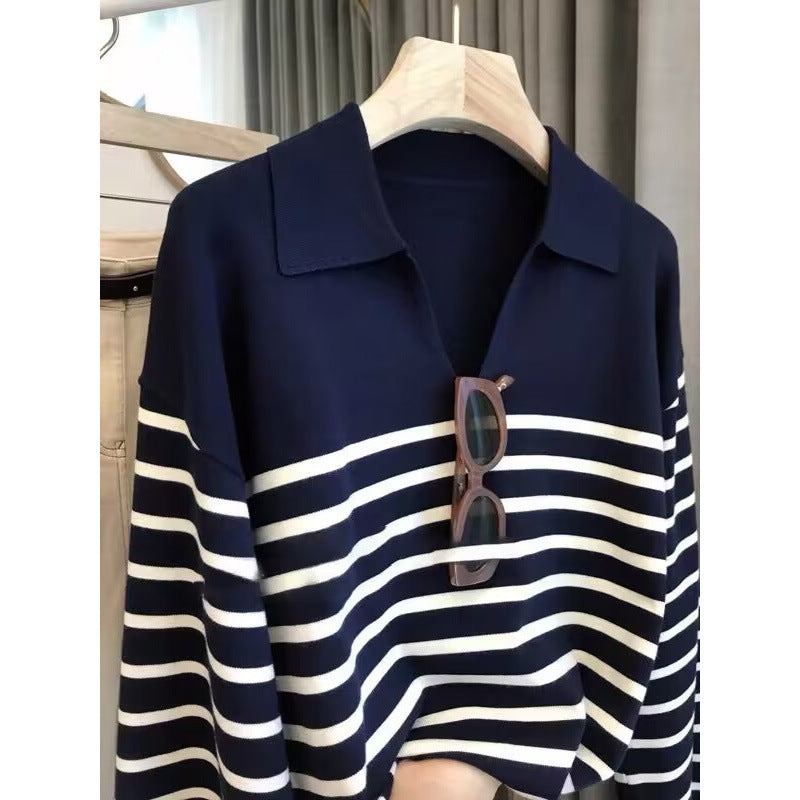Navy striped V-neck pullover sweater with cream stripe bands, long sleeves