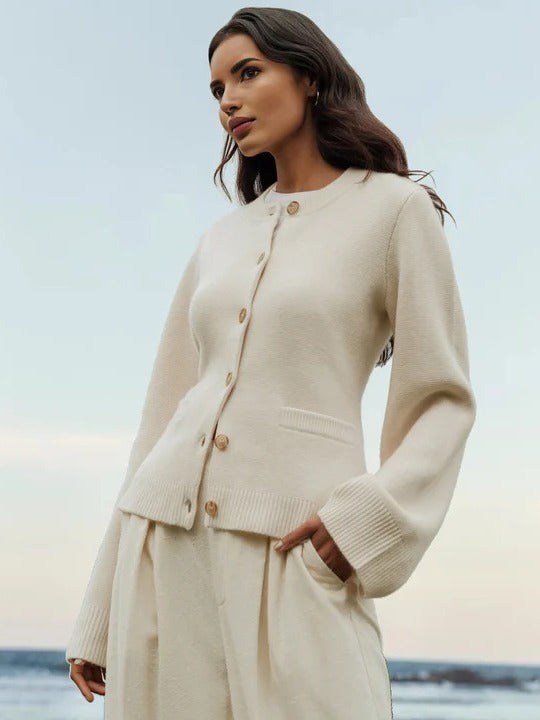 Off-white cashmere knit cardigan with gold-tone buttons, round neck, long sleeves