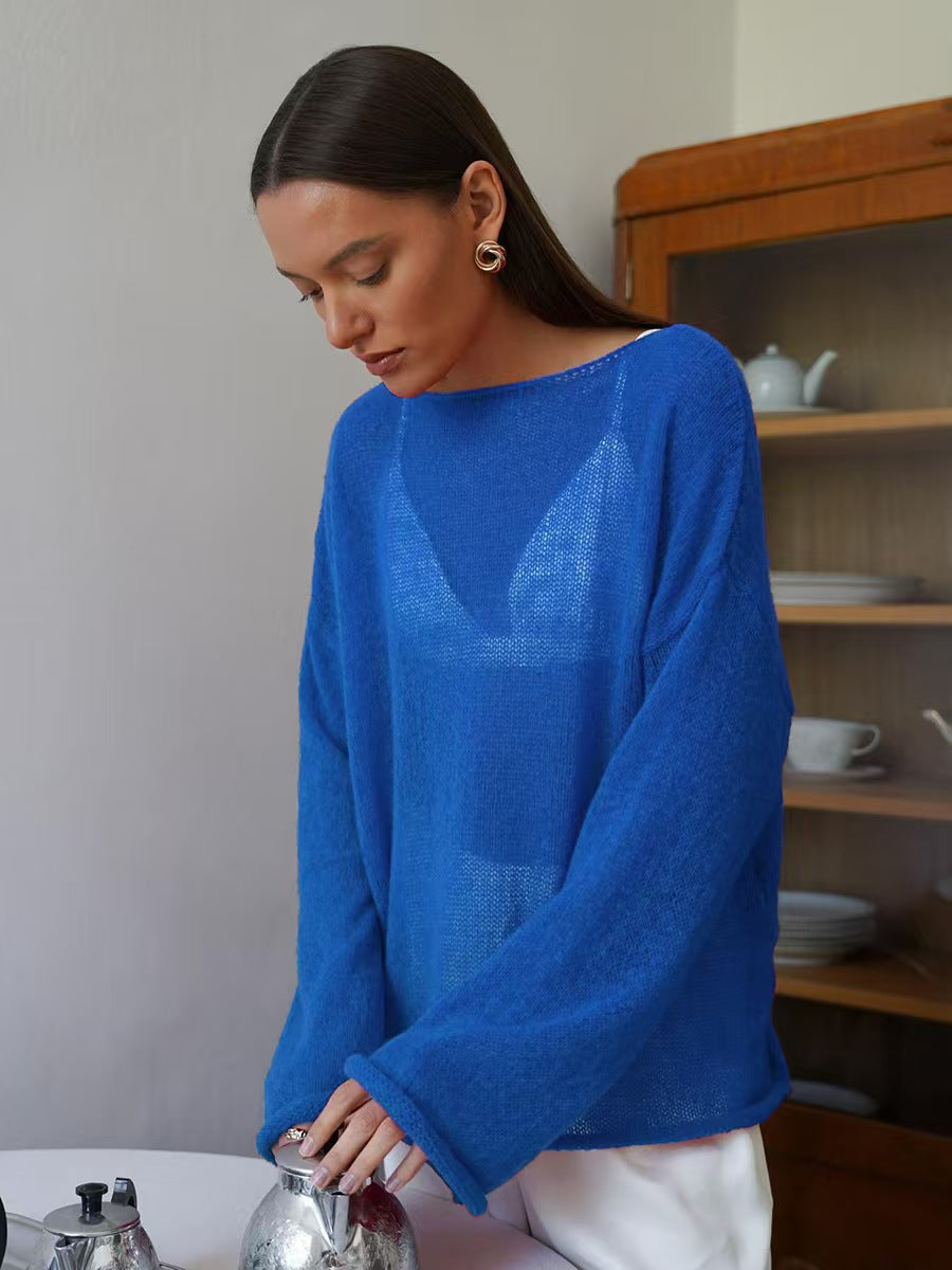 Blue women’s loose knit sweater top with round neck and long sleeves, breathable sheer knit