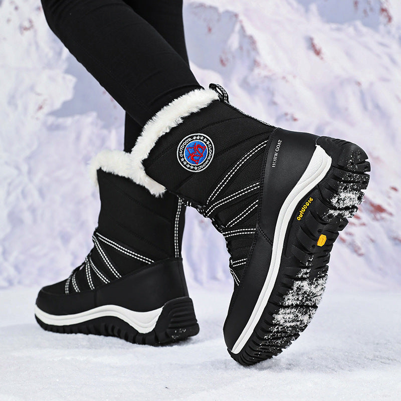 Women’s snow boots, black high-top with faux-fur trim and laces, rubber traction outsole