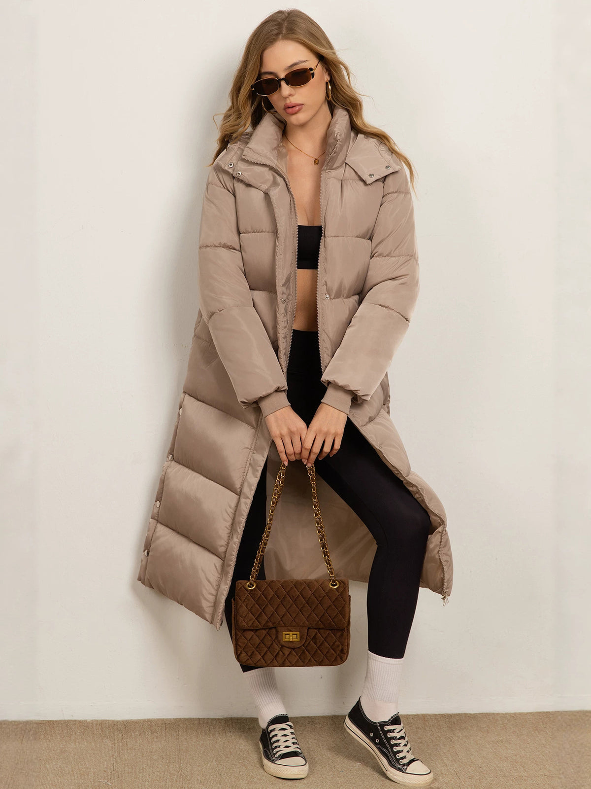 Women's taupe long padded coat with hood, zip front and side pockets
