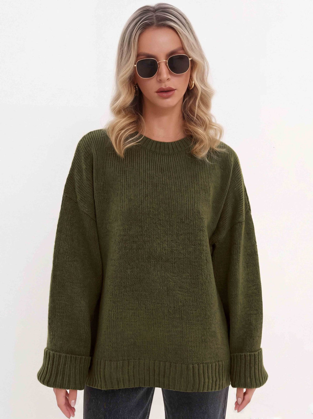Front view of a loose military green sweater with ribbed crew neck, cuffs, and hem