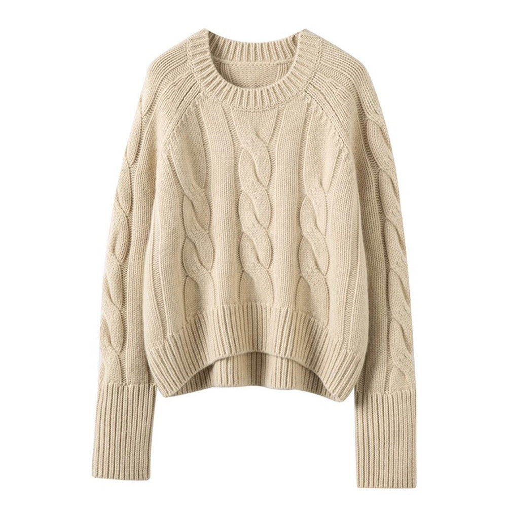 Cream cable-knit turtleneck sweater, textured knit pattern with ribbed cuffs and hem.
