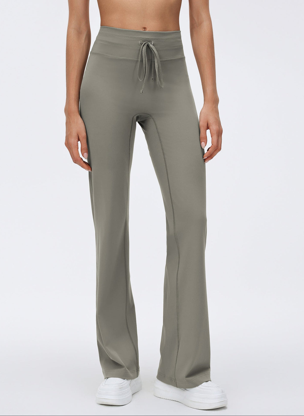 Olive green high-waisted drawstring flared yoga pants with relaxed wide-leg fit