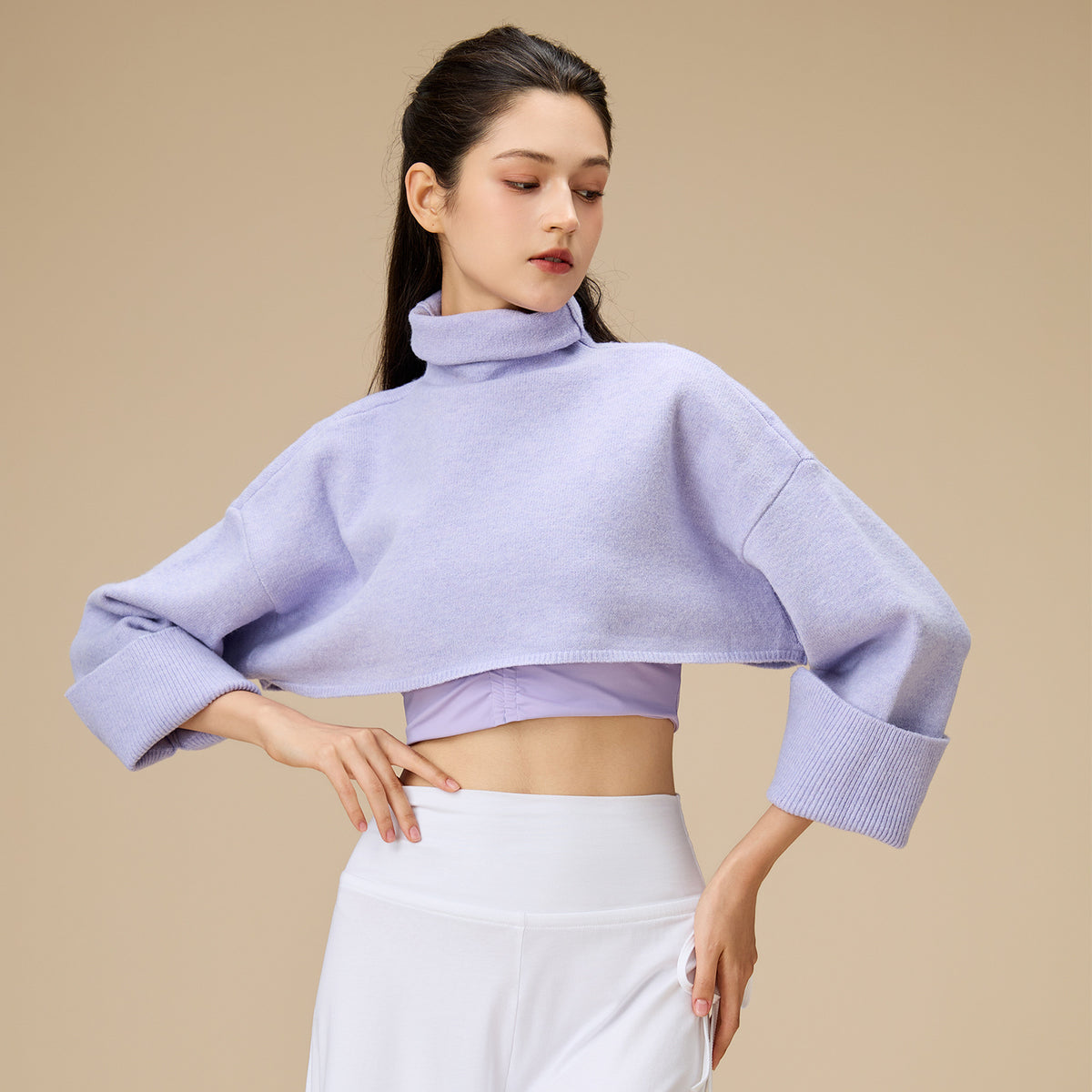 Lavender cropped turtleneck yoga sweatshirt with long sleeves and ribbed cuffs
