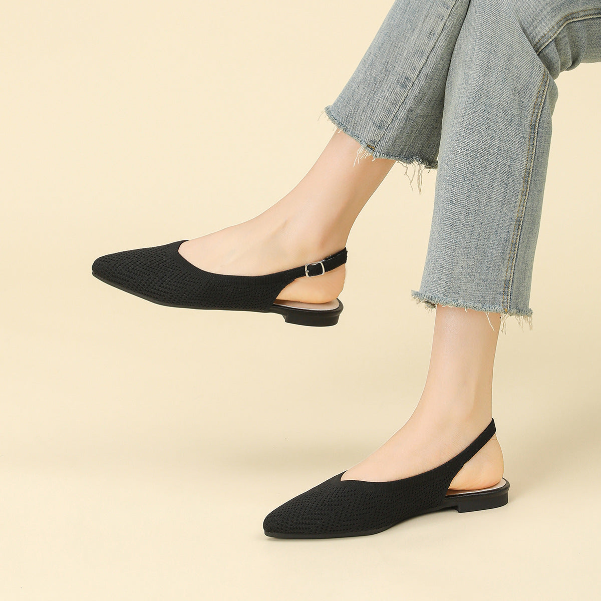 Black netted woven pointed-toe slingback sandals with ankle strap and low heel