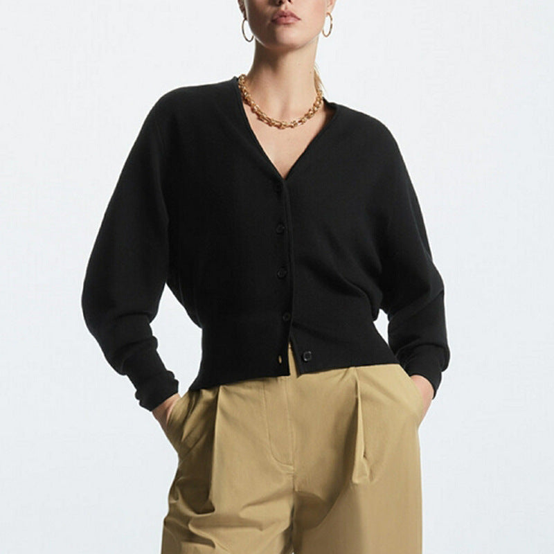 Black oversized V-neck button-front knit cardigan with drop shoulders