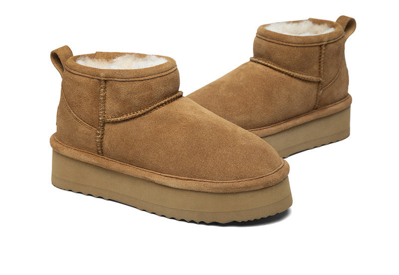 Tan suede slip-on snow boots with fleece lining and chunky rubber sole
