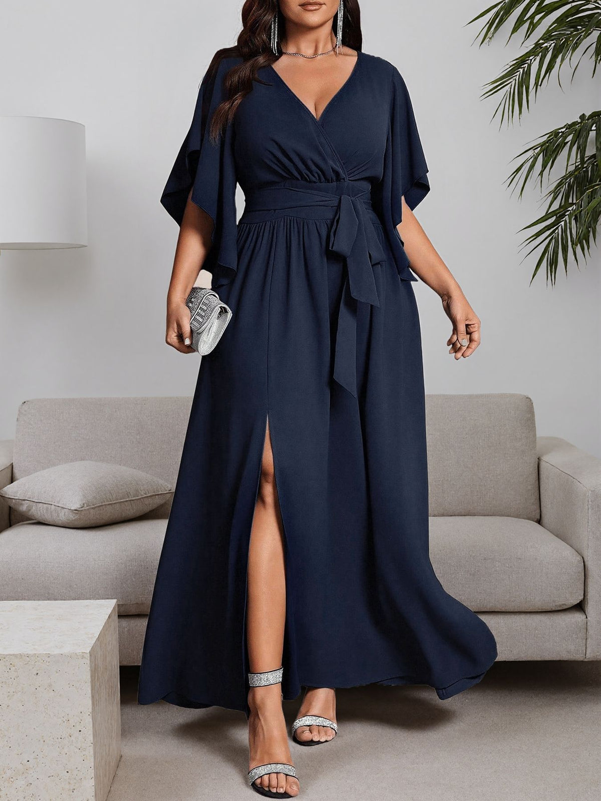 Navy blue plus-size maxi dress with V-neck, tie waist, side slit, flutter short sleeves